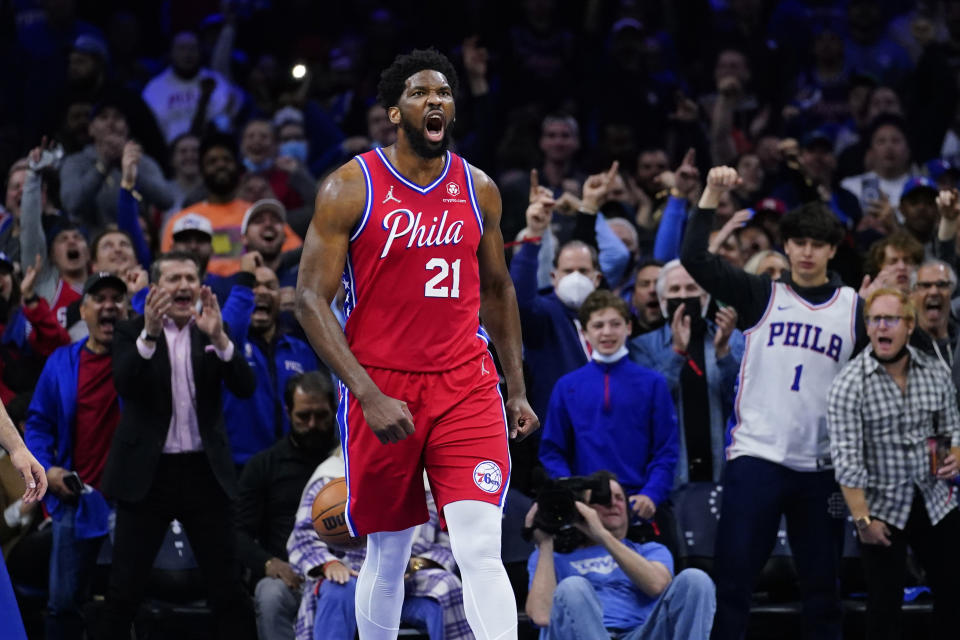 Philadelphia 76ers' Joel Embiid reacts after making a basket during Game 2 of their NBA playoffs first-round series against the Toronto Raptors on April 18, 2022, in Philadelphia. (AP Photo/Matt Slocum)