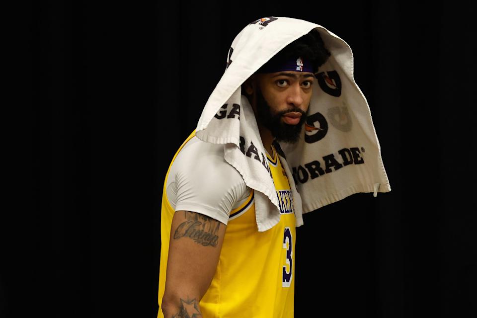 Los Angeles Lakers' Anthony Davis walks off the court following the NBA game against the Phoenix Suns at Footprint Center on April 05, 2022 in Phoenix, Arizona. The Suns defeated the Lakers 121-110.