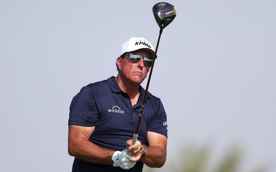 Phil Mickelson of the United States tees off on the 14th hole during day one of the PIF Saudi International at Royal Greens Golf &amp; Country Club on February 3, 2022 in Al Murooj, Saudi Arabia. - GETTY IMAGES