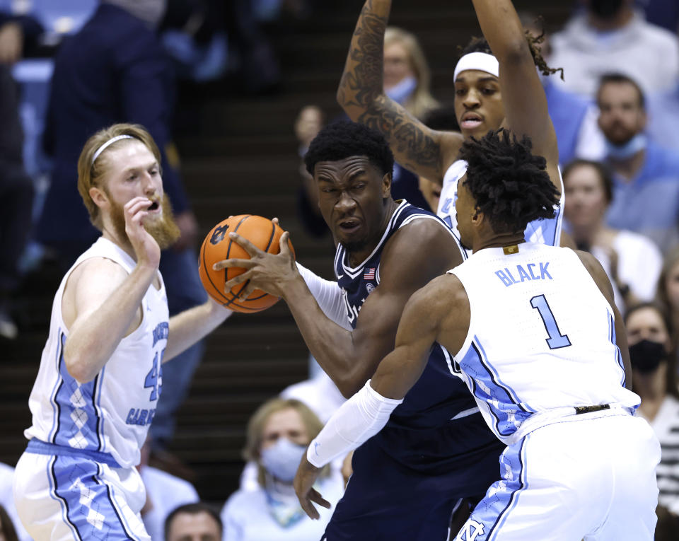 UNC's Brady Manek, Armando Bacot and Leaky Black defend Duke's Mark Williams during a game on Feb. 5. UNC plays Duke in the Final Four on Saturday. (Grant Halverson/Getty Images)