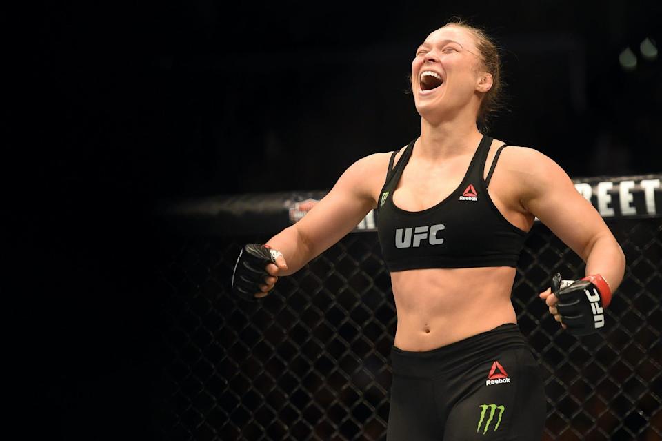 Ronda Rousey celebrates one of her many wins in the UFC's Octagon.