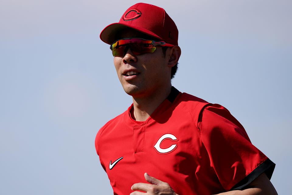 Cincinnati Reds outfielder Shogo Akiyama (4) jogs in between drills, Wednesday, March 16, 2022, at the baseball team's spring training facility in Goodyear, Ariz.