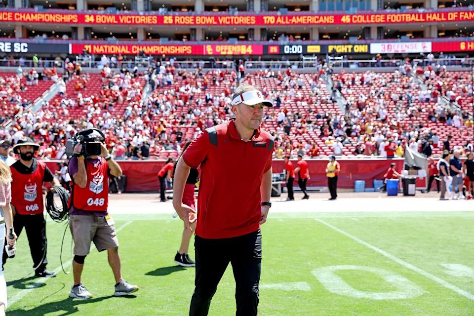 USC coach Lincoln Riley turns toward midfield at the end of the Trojans' spring football game