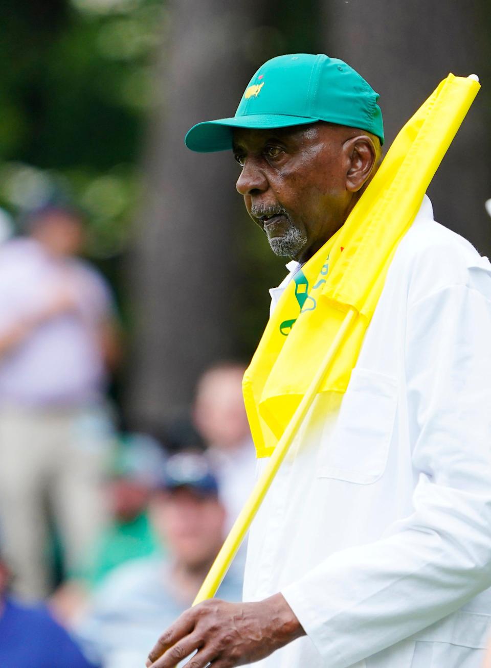 Apr 6, 2022; Augusta, Georgia, USA; Carl Jackson caddies for Ben Crenshaw during the Par 3 Contest at The Masters golf tournament at Augusta National Golf Club.