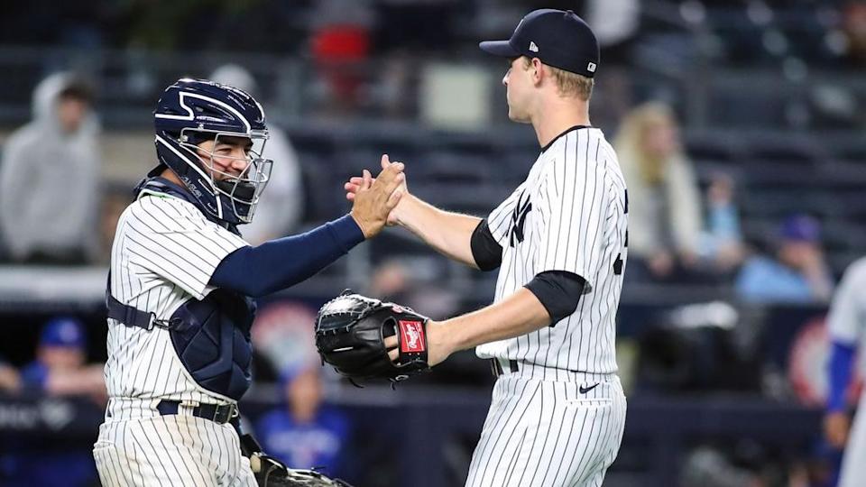 Michael King Jose Trevino handshake pinstripes