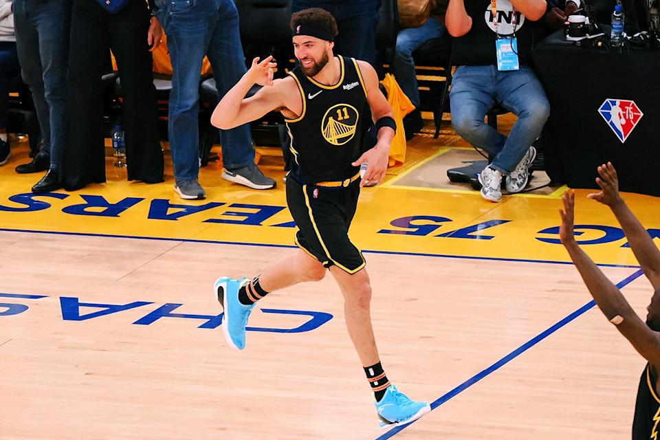 Golden State Warriors guard Klay Thompson reacts after making a 3-pointer against the Dallas Mavericks during the second half of Game 5 of the Western Conference finals at Chase Center in San Francisco on May 26, 2022. (Kelley L Cox/USA TODAY Sports)