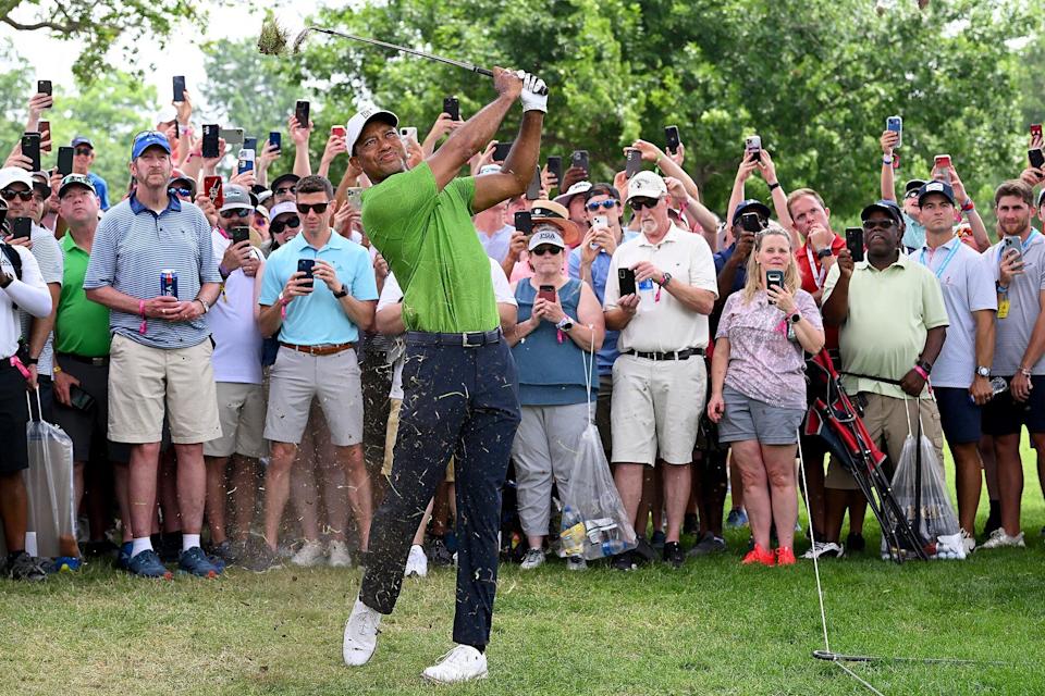 Tiger Woods plays his second shot on the first hole during the second round of the 2022 PGA Championship
