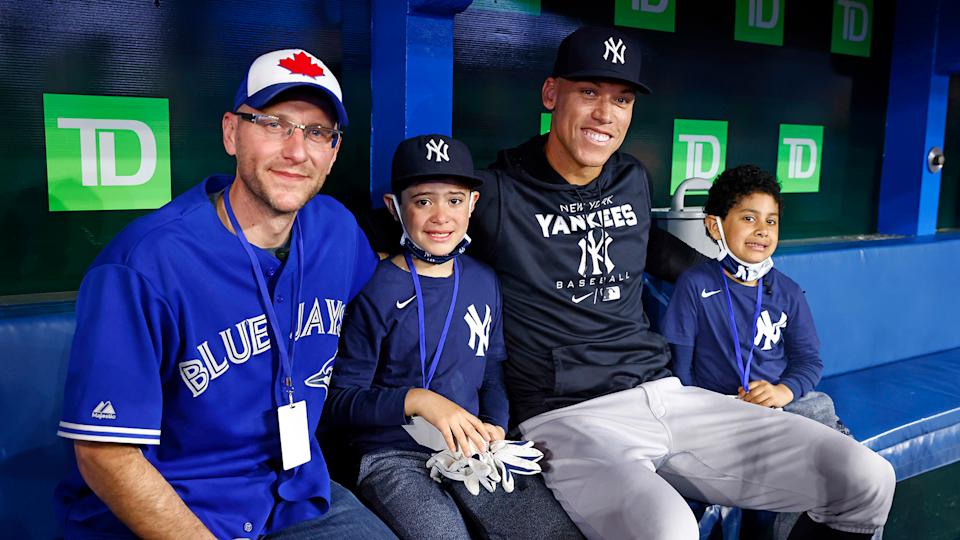 Aaron Judge met with the two fans at the centre of Tuesday's viral moment ahead of Wednesday's Blue Jays vs. Yankees game. (Photo by Vaughn Ridley/Getty Images)