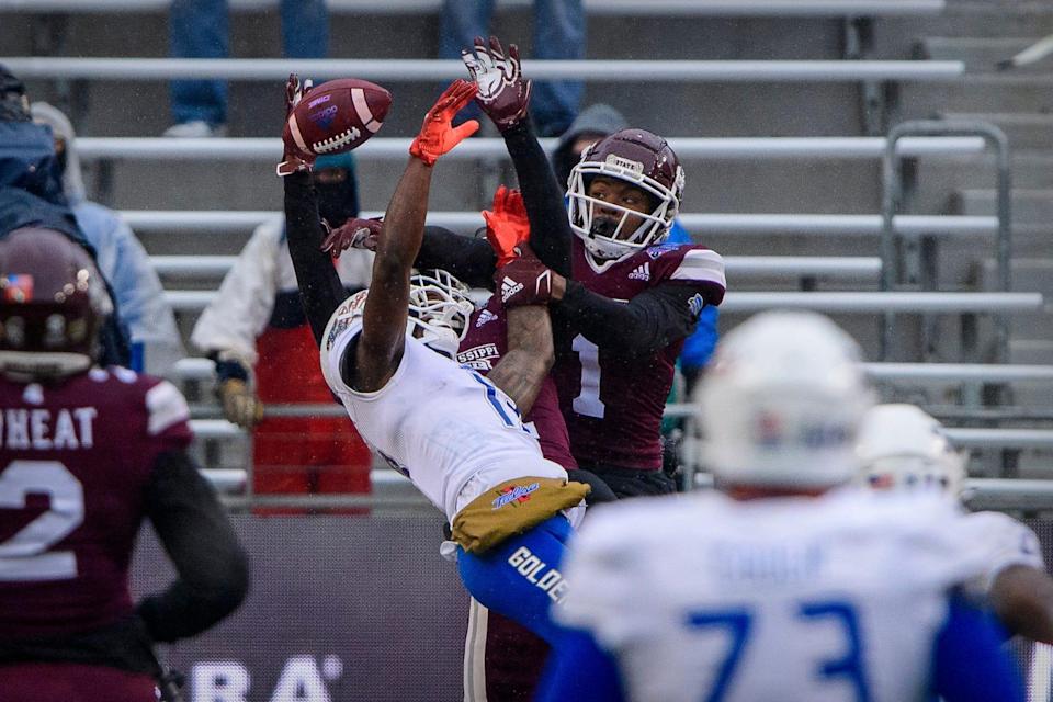 Armed Forces Bowl: Mississippi State cornerback Martin Emerson breaks up a pass intended for Tulsa wide receiver Josh Johnson during the first half at Amon G. Carter Stadium.