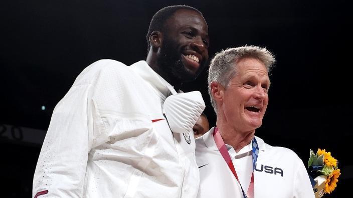 This August 2021 photo shows Draymond Green (left) and Steve Kerr of Team United States celebrating during the Men’s Basketball medal ceremony at the delayed Tokyo 2020 Olympic Games. (Photo: Gregory Shamus/Getty Images)