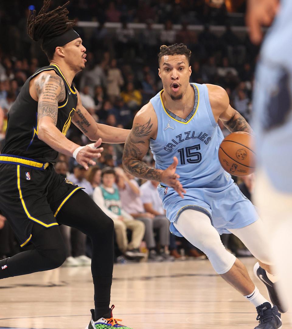 Memphis Grizzlies forward Brandon Clarke drives past Golden State Warriors forward Damion Lee at FedExForum on Monday, March 28, 2022. 