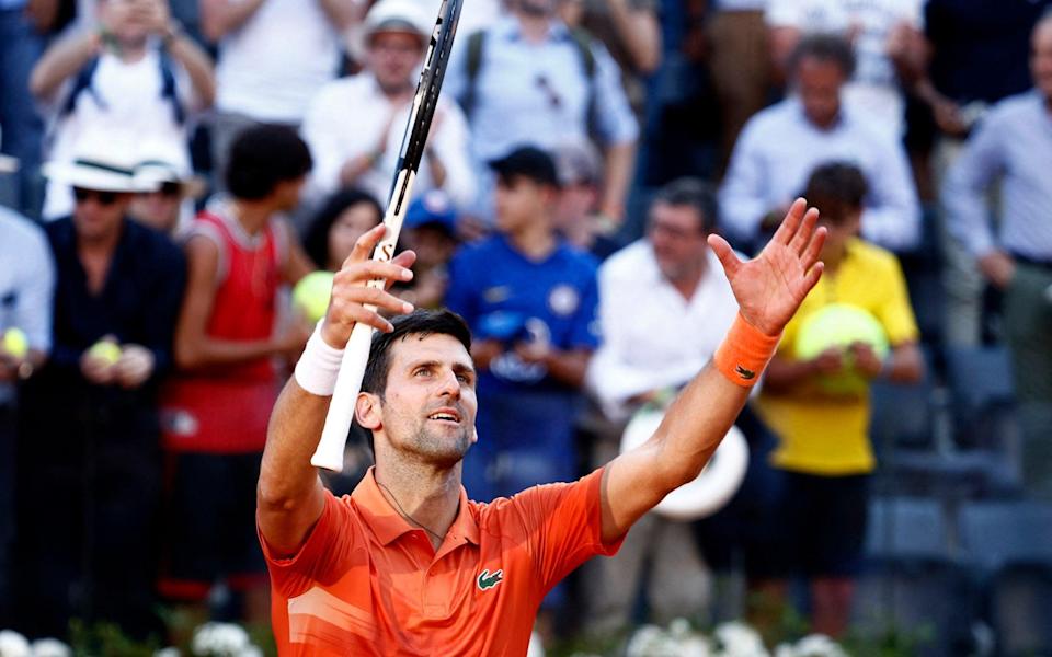 Novak Djokovic celebrates victory - REUTERS