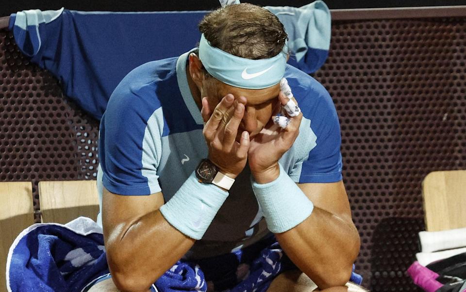 Rafael Nadal looks disconsolate - SHUTTERSTOCK