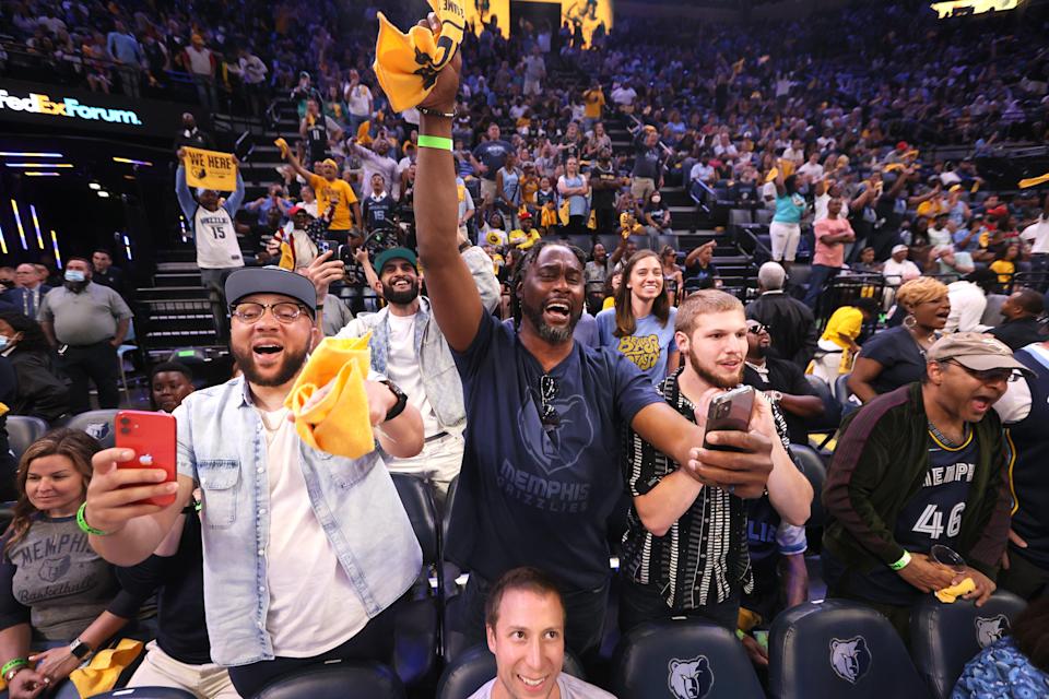 May 1, 2022; Memphis, Tennessee, USA; Memphis Grizzlies fans cheer as Golden State Warriors forward Draymond Green (23) is ejected during game one of the second round for the 2022 NBA playoffs at FedExForum. Mandatory Credit: Joe Rondone-USA TODAY Sports