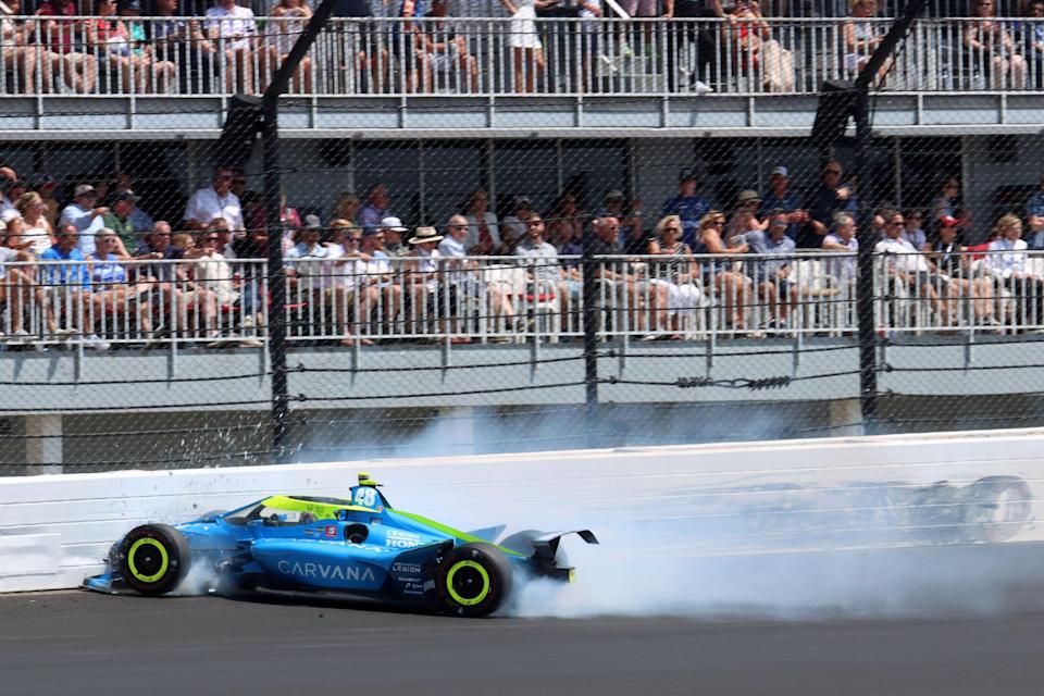 Chip Ganassi Racing driver Jimmie Johnson (48) crashes in turn two Sunday, May 29, 2022, during the 106th running of the Indianapolis 500 at Indianapolis Motor Speedway