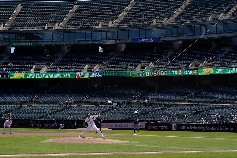 Oakland Athletics' Frankie Montas pitches against the Tampa Bay Rays during the first inning of a baseball game in Oakland, Calif., Wednesday, May 4, 2022. (AP Photo/Jeff Chiu)