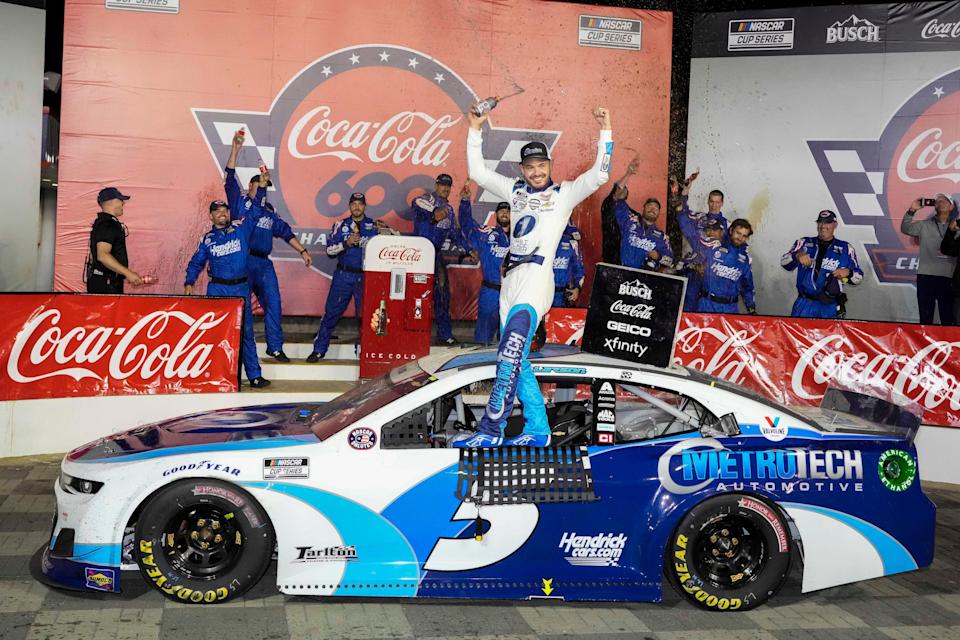 Kyle Larson celebrates after winning the 2021 Coca-Cola 600 at Charlotte Motor Speedway.