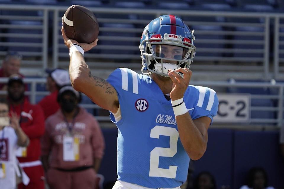 Mississippi quarterback Matt Corral warms up with some throwing.