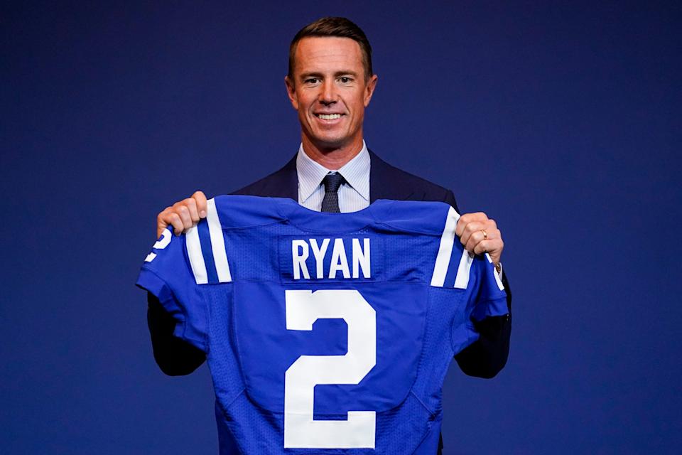 Indianapolis Colts quarterback Matt Ryan holds his new jersey following a press conference at the NFL team's practice facility in Indianapolis, Tuesday, March 22, 2022.