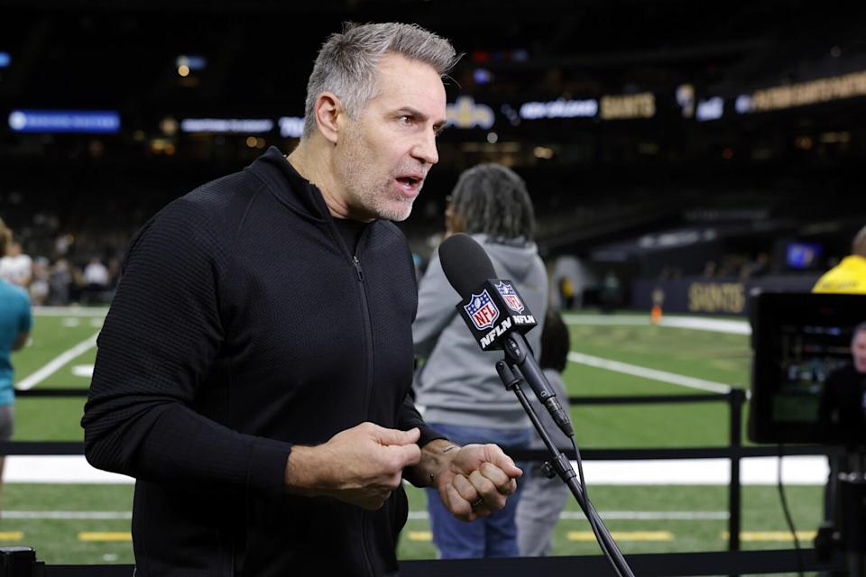 Kurt Warner prepares from sidelines in New Orleans for an NFL broadcast last December.