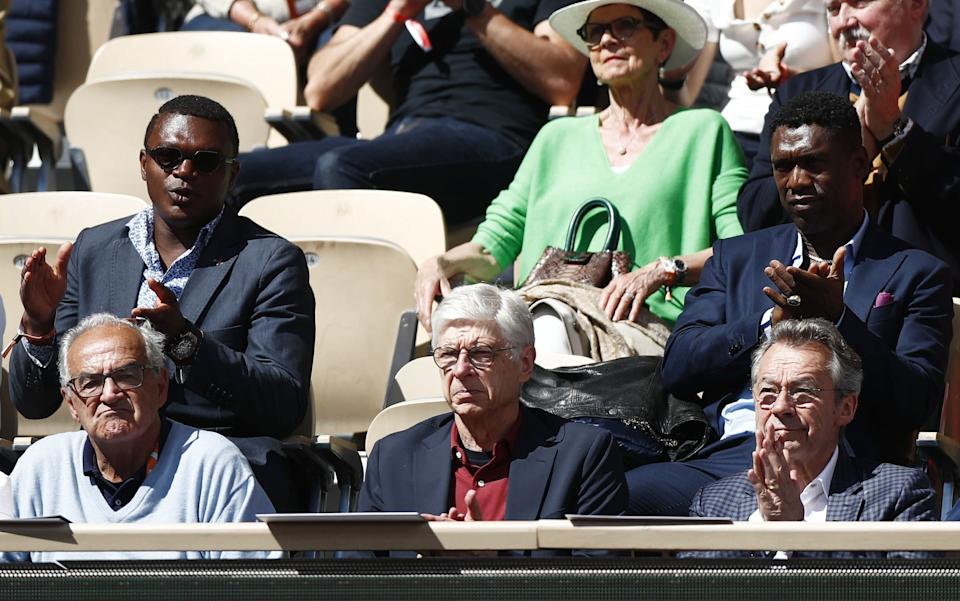 Arsene Wenger was in the crowd at Roland Garros as was other football legends Clarence Seedorf second row R) and former French international Marcel Desailly (second row L) - SHUTTERSTOCK