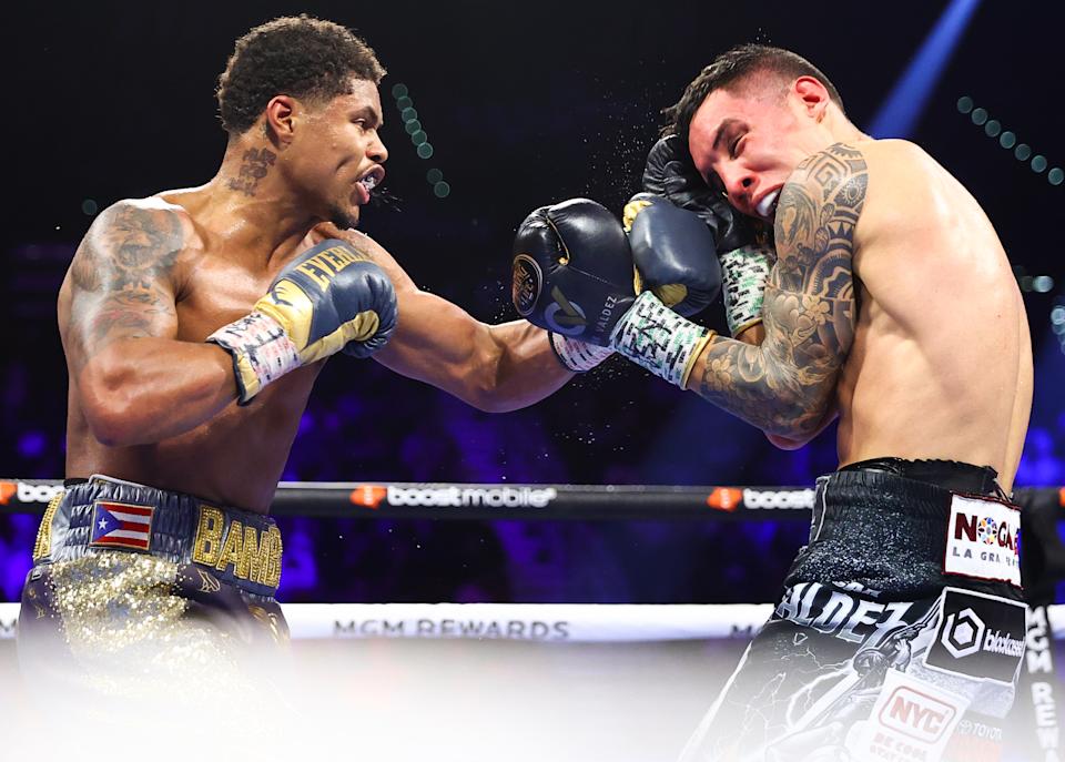 LAS VEGAS, NEVADA - APRIL 30: Shakur Stevenson (L) and Oscar Valdez (R) exchange punches during their WBC and WBO junior lightweight championship at MGM Grand Garden Arena on April 30, 2022 in Las Vegas, Nevada. (Photo by Mikey Williams/Top Rank Inc via Getty Images)