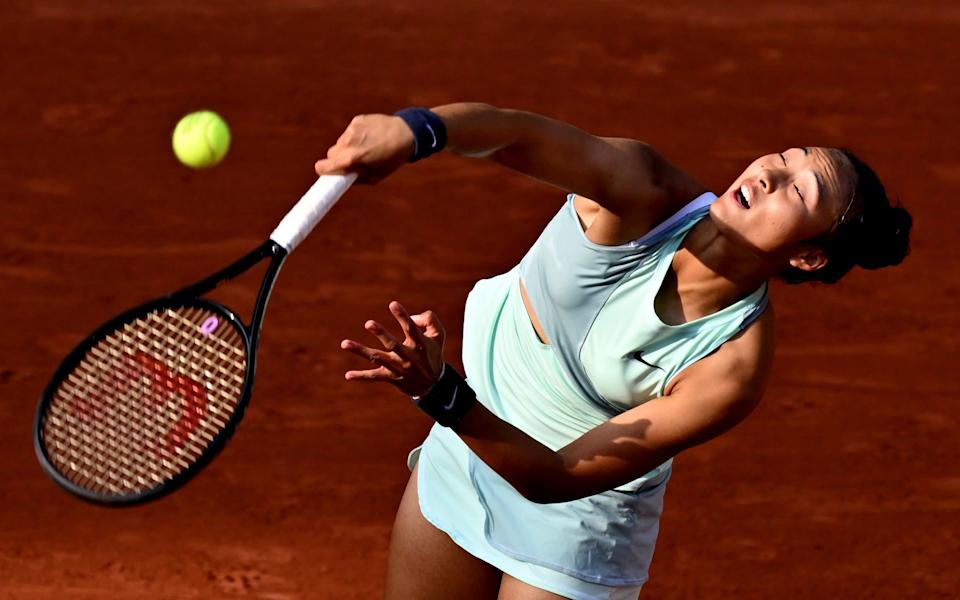 Qinwen Zheng of China in action against Iga Swiatek&nbsp; - Anadolu Agency via Getty Images