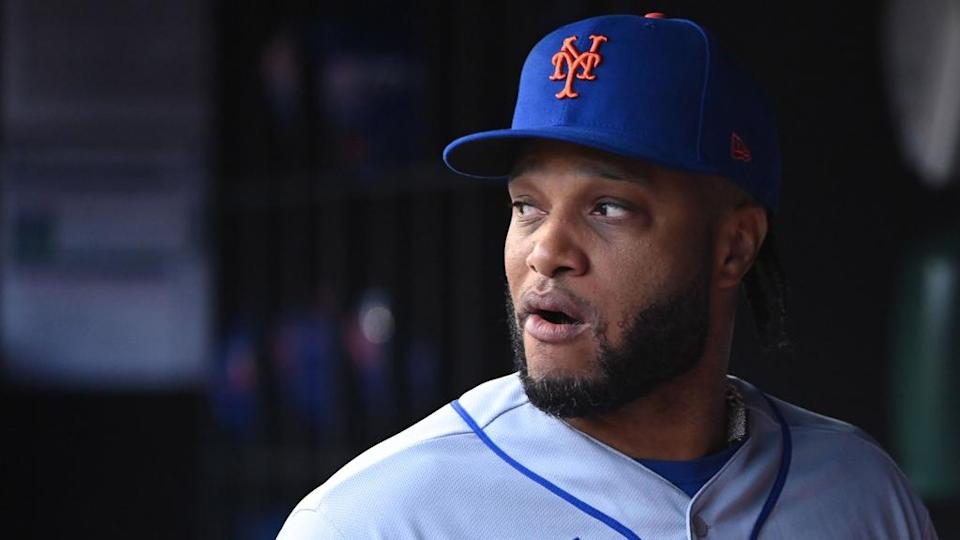 Robinson Cano in dugout closeup road grays April 2022