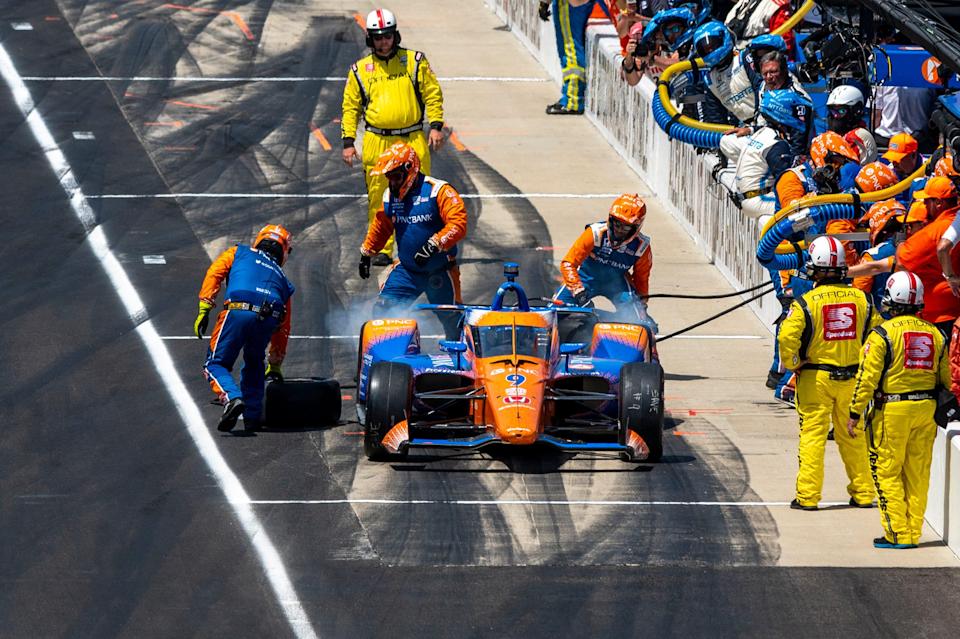 Scott Dixon leaves his pit box during the 2022 Indy 500 but is assessed a speeding penalty for entering too fast.