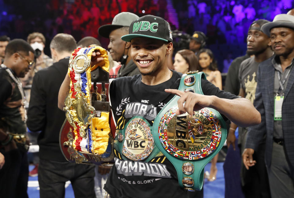 LAS VEGAS, NEVADA - APRIL 30: WBO junior lightweight champion Shakur Stevenson poses with belts after defeating WBC champion Oscar Valdez in a title unification fight at MGM Grand Garden Arena on April 30, 2022 in Las Vegas, Nevada. Stevenson took the WBC title by unanimous decision. (Photo by Steve Marcus/Getty Images)