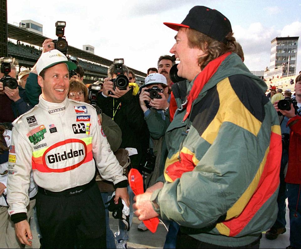 Scott Brayton reacts to team owner John Menard in the pit area after setting a new four lap track record and securing the pole for the 80th running of the Indianapolis 500 in 1996. Brayton was killed in practice just a few days later.
