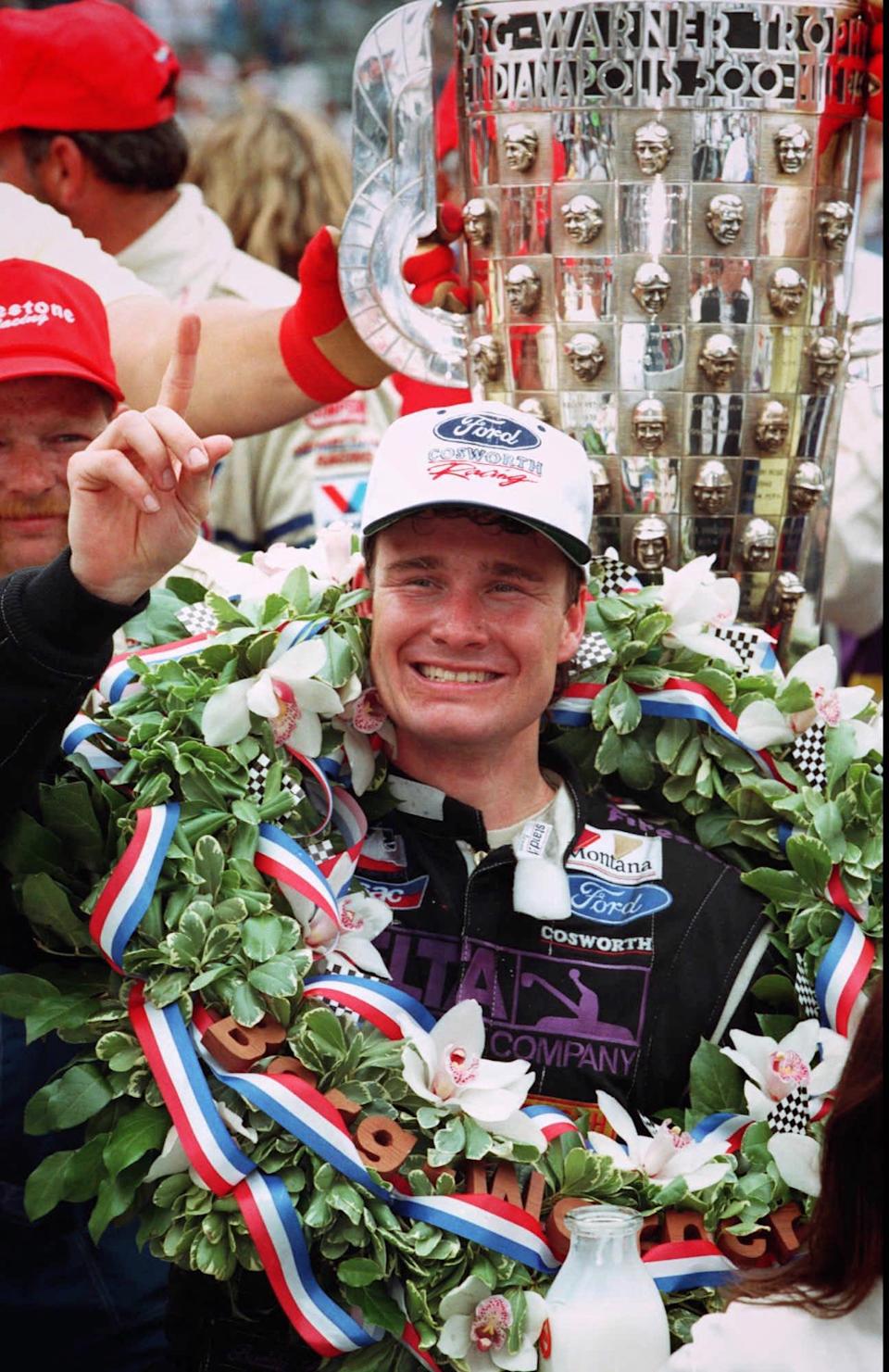 Buddy Lazier of Vail Colo. celebrates in Victory Lane after winning the Indianapolis 500 at the Indianapolis Motor Speedway Sunday May 26 1996.