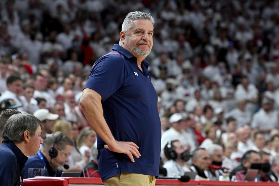 Auburn coach Bruce Pearl on the sidelines against Arkansas during the first half of an NCAA college basketball game Tuesday, Feb. 8, 2022, in Fayetteville, Ark. (AP Photo/Michael Woods)