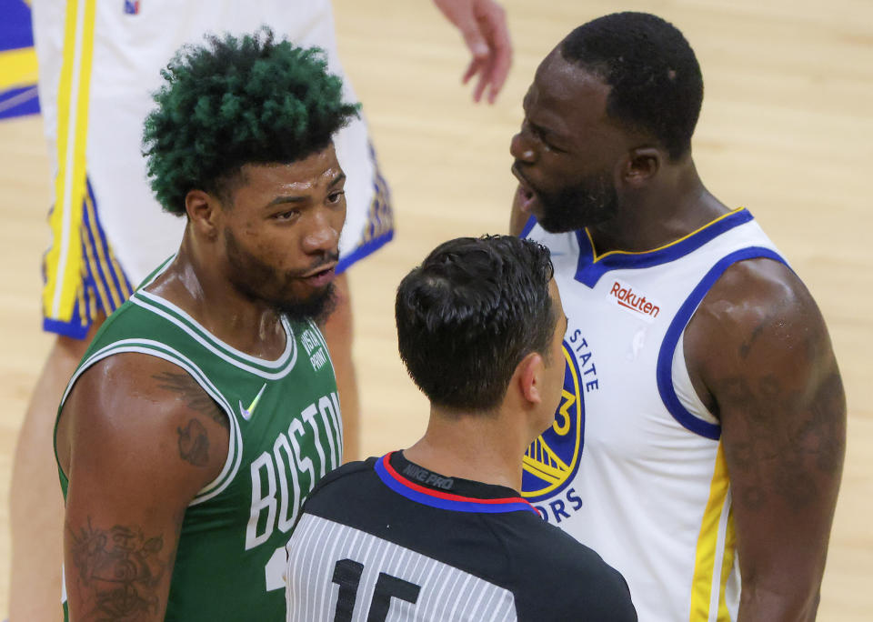 Celtics' Marcus Smart and Golden State's Draymond Green in Game 2 of the NBA Finals