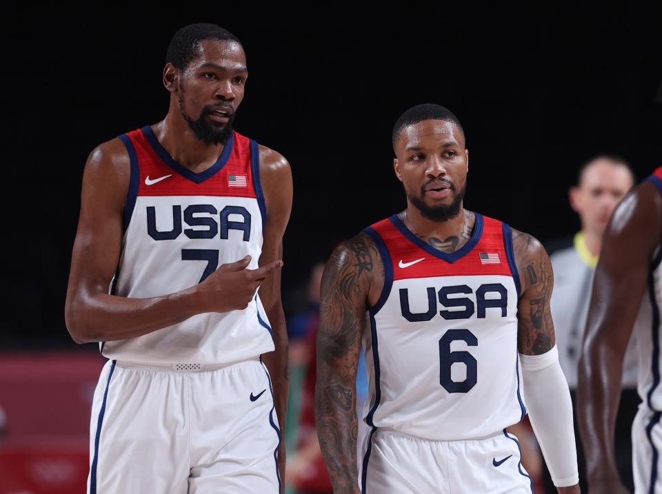 Kevin Durant L of the United States talks with Damian Lillard during the men's basketball semifinal between the United States and Australia at Tokyo 2020 Olympic Games in Saitama, Japan, Aug. 5, 2021. (Photo by Meng Yongmin/Xinhua via Getty Images)