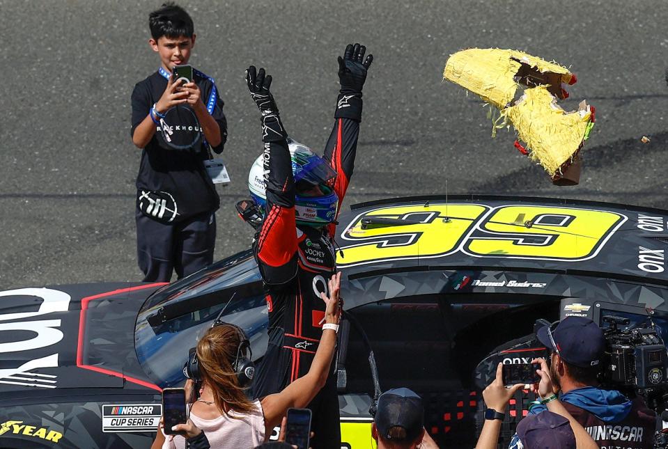 Daniel Suarez celebrates after winning the NASCAR Cup Series Toyota/Save Mart 350 at Sonoma Raceway.