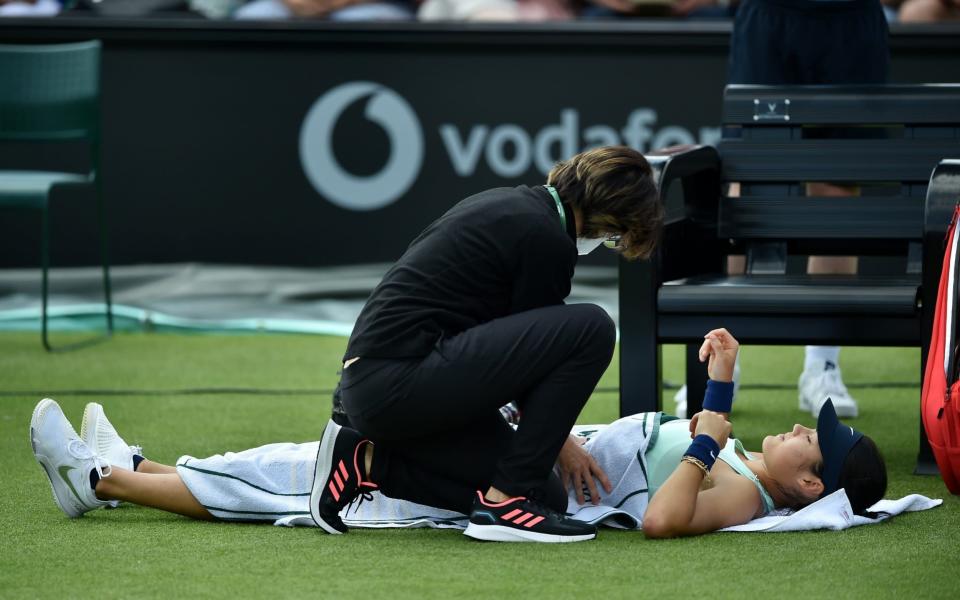 Raducanu gets treatment. - GETTY IMAGES