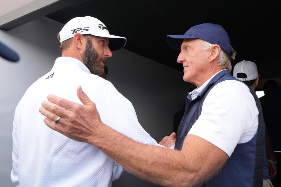 ST ALBANS, ENGLAND - JUNE 09: Greg Norman shakes hands with Dustin Johnson of 4 Aces GC during day one of the LIV Golf Invitational - London at The Centurion Club on June 09, 2022 in St Albans, England. (Photo by Aitor Alcalde/LIV Golf/Getty Images)