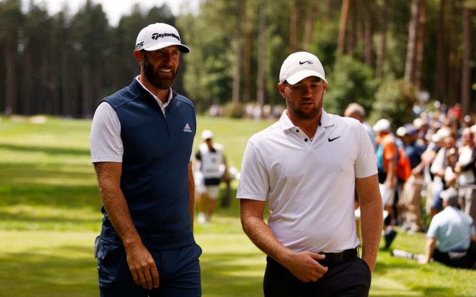 Sam Horsfield (R) with Dustin Johnson - PA