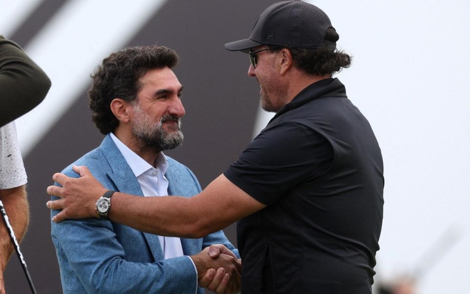 Newcastle United chairman Yasir Al-Rumayyan with Phil Mickelson after Thursday's opening round - ACTION IMAGES