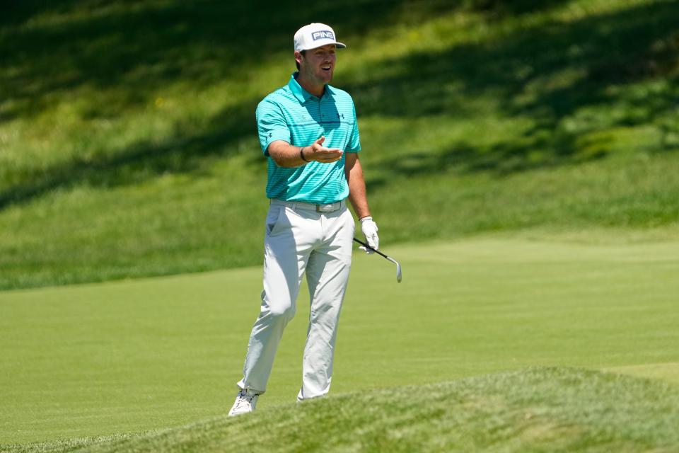 Mito Pereira reacts to his ball stopping just beside the 14th hole during the third round of the Memorial Tournament at Muirfield Village Golf Club. The ball fell into the cup for a birdie, but officials said Pereira did not address the ball in the required time and changed his score to a par.