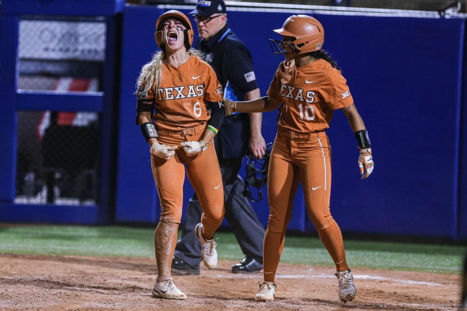 UT outfielder Bella Dayton (6) screams after scoring a run as the Oklahoma State Cowgirls face the Texas Longhorns in the second game of the 2022 Women's College World Series semifinal at USA Softball Hall of Fame Complex in Oklahoma City on Monday, June 6, 2022.