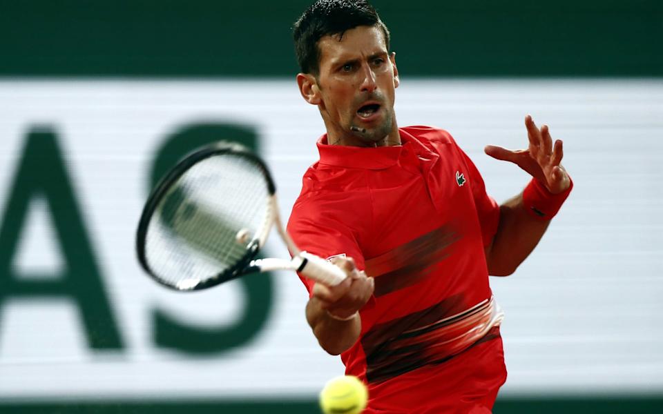 Novak Djokovic of Serbia plays Rafael Nadal of Spain in their men's quarterfinal match during the French Open tennis tournament at Roland Garros - &nbsp;MOHAMMED BADRA/EPA-EFE/Shutterstock