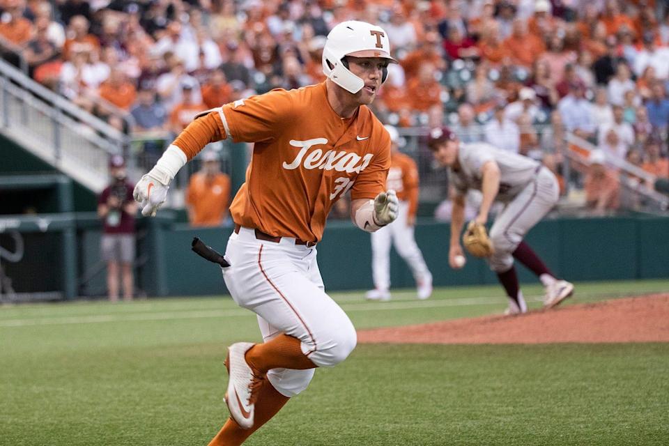 Texas's Eric Kennedy runs to first during the game against Texas A&amp;M at Disch-Falk Field on Tuesday, March 29, 2022. 