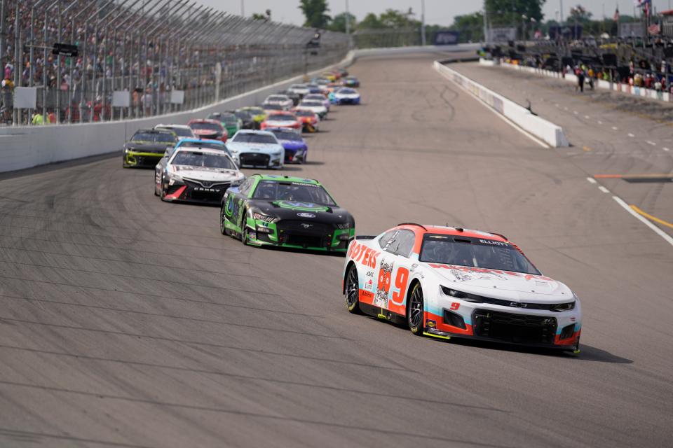 Chase Elliott (9) enters Turn 1 during a NASCAR Cup Series auto race at World Wide Technology Raceway, Sunday, June 5, 2022, in Madison, Ill. (AP Photo/Jeff Roberson)