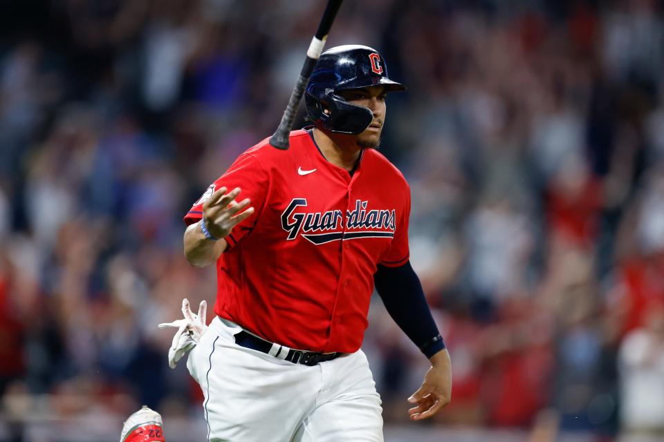 Cleveland Guardians' Josh Naylor tosses his bat after hitting a game-winning, two-run home run against the Minnesota Twins during the 10th inning Wednesday, June 29, 2022, in Cleveland. (AP Photo/Ron Schwane)