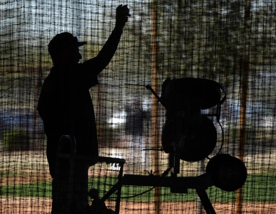 Pitching machines, long a stagnant staple of baseball's routines, have taken a technological leap forward in recent years. (Photo by Ron Vesely/MLB Photos via Getty Images)