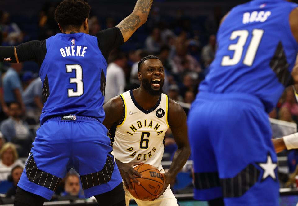 Mar 2, 2022; Orlando, Florida, USA;Indiana Pacers guard Lance Stephenson (6) moves to the basket as Orlando Magic forward Chuma Okeke (3) defends during the first quarter at Amway Center.