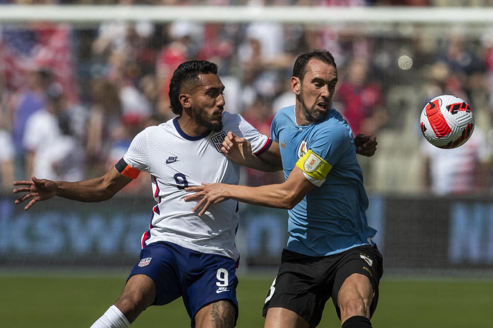 KANSAS CITY, KS - JUNE 05: United States forward Jesus Ferreira (9) chases down Uruguay defender Diego Godin (3) during the match between the USMNT and Uruguay on Sunday June 5th, 2022 at Childrens Mercy Park in Kansas City, KS. (Photo by Nick Tre. Smith/Icon Sportswire via Getty Images)