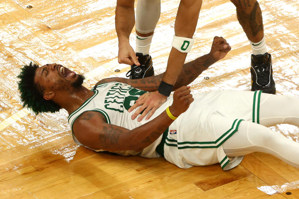 Boston Celtics guard Marcus Smart celebrates during the fourth quarter of Game 3 against the Golden State Warriors in the NBA Finals. (Elsa/Getty Images)